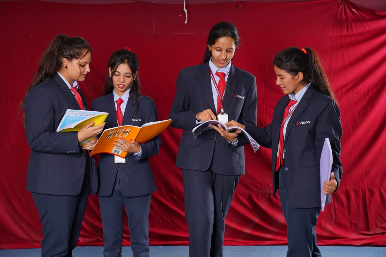 A library filled with books and students studying